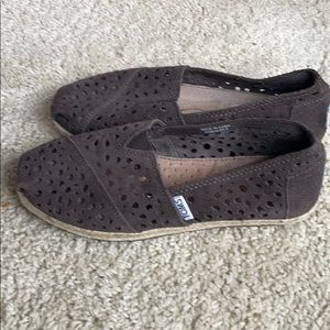 Tom’s brown cutout slip on shoes